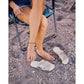 HEYDUDE Women's Christi Slide Distressed Sandal in Metallic